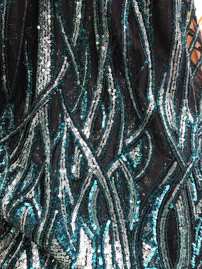 Peacock/silver glitz sequins Leaf Design one side border with mesh base 2way 54/55" Sold by the YD. Ships worldwide from Los Angeles CA, US