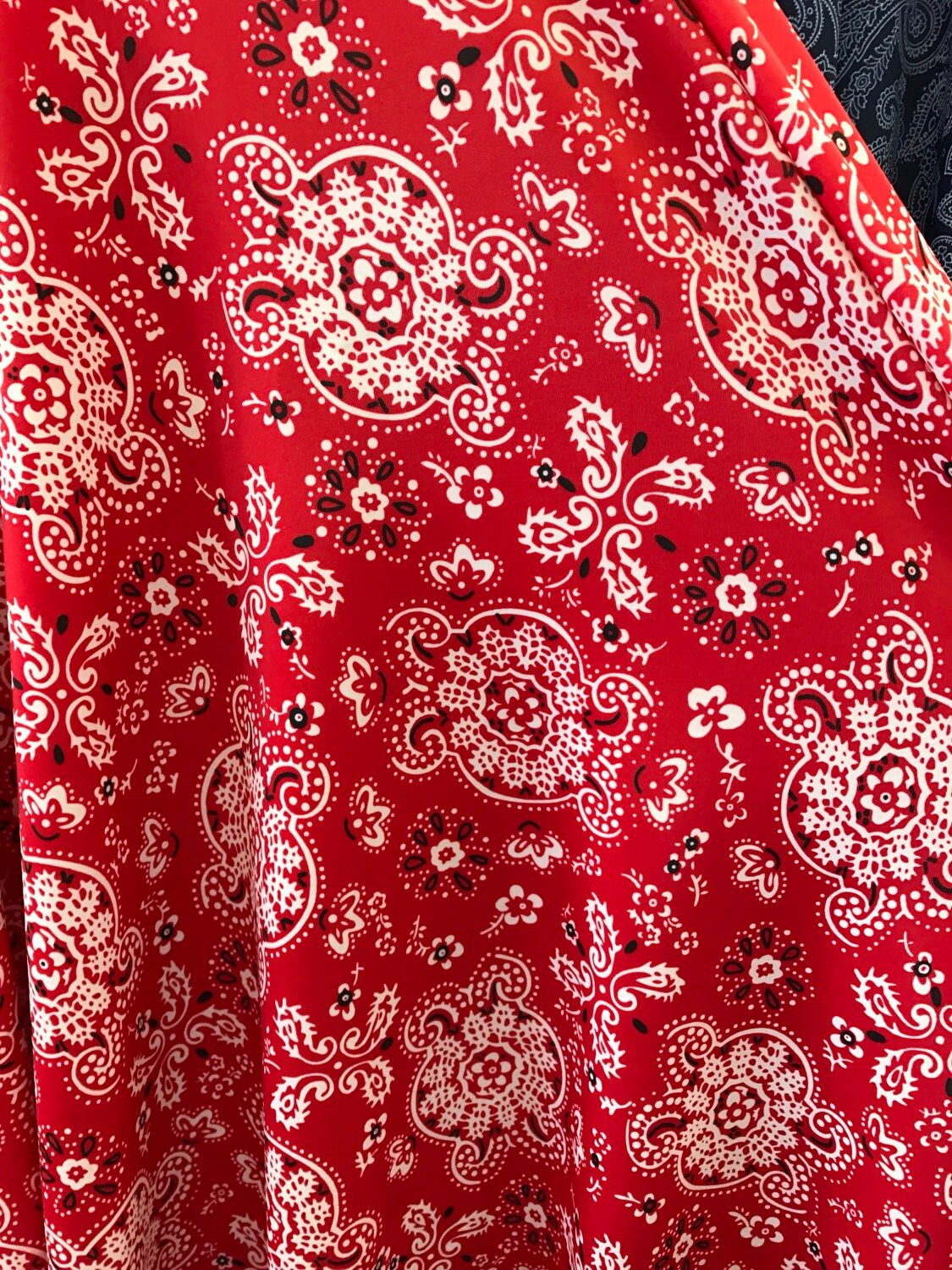 Bandana paisley design on nylon spandex 4way Stretch 58/60" Sold by the YD. Ships worldwide from Los Angeles California USA