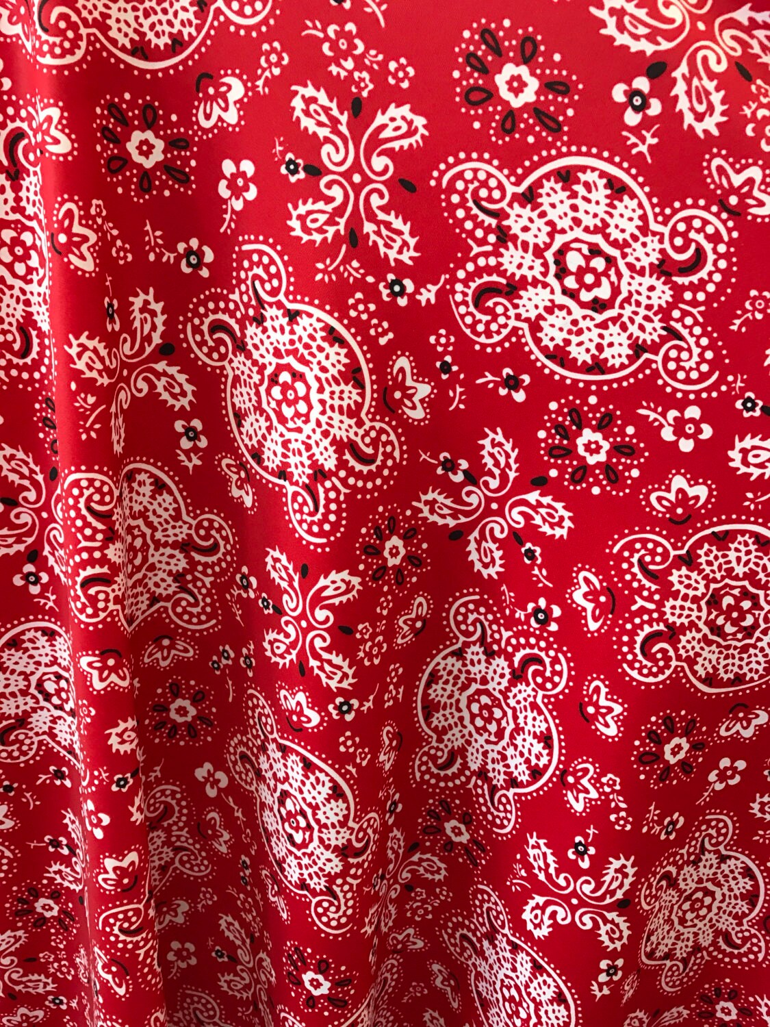 Bandana paisley design on nylon spandex 4way Stretch 58/60" Sold by the YD. Ships worldwide from Los Angeles California USA