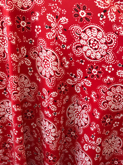 Bandana paisley design on nylon spandex 4way Stretch 58/60" Sold by the YD. Ships worldwide from Los Angeles California USA