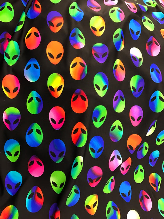 Nylon spandex Alien design it glows in the dark 4way stretch 58/60" sold by the yd. Ships worldwide from Los Angeles California USA
