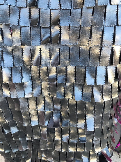 Piano design made off fake leather vinyl on strech mesh base 2way stretch 58/60" Sold by the YD. Ships worldwide from Los Angeles California