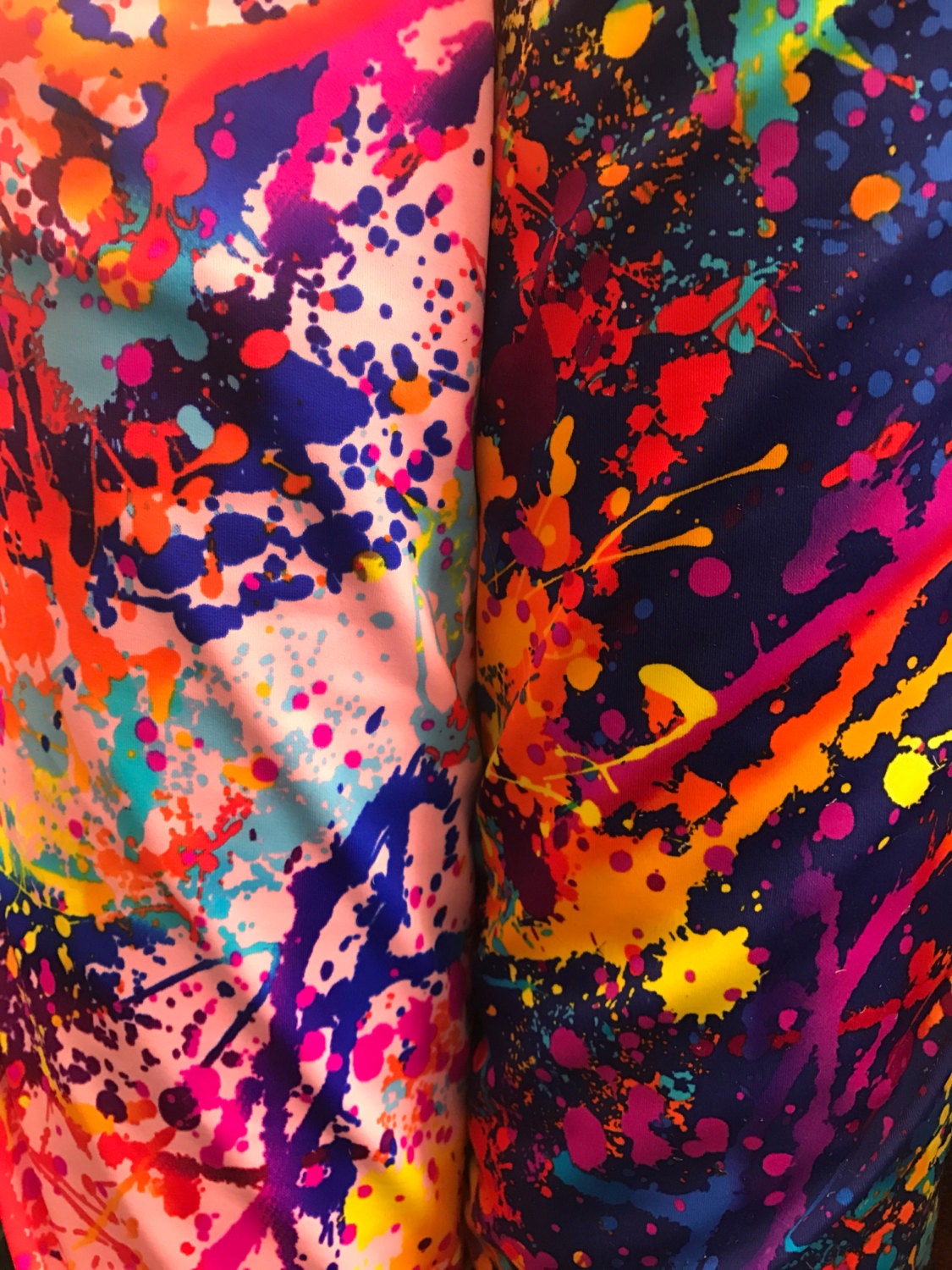 Graffiti paint design nylon spandex with foggy foil  4-way stretch. 58/60" sold by the YD. Ships worldwide from Los Angeles California USA