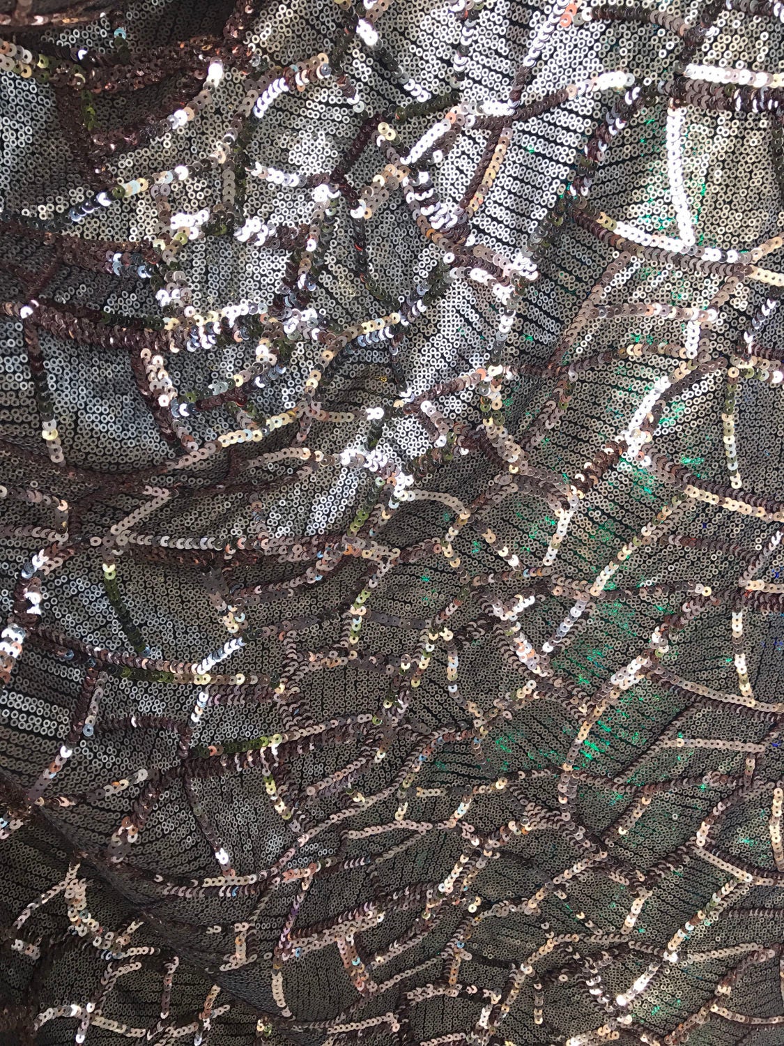 Spider design rose gold sequins 2-size all over on spandex mesh base 55/56" Sold by the yd. ships worldwide from Los Angeles California USA.