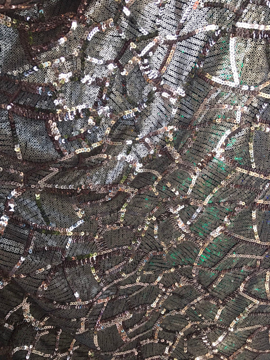 Spider design rose gold sequins 2-size all over on spandex mesh base 55/56" Sold by the yd. ships worldwide from Los Angeles California USA.