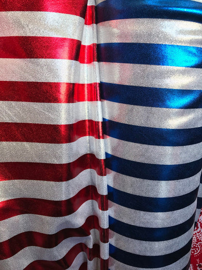 Metallic stripe nylon spandex 4way Stretch with foggy foil all over 58/60" Sold by the yd. Ships worldwide from Los Angeles California USA.