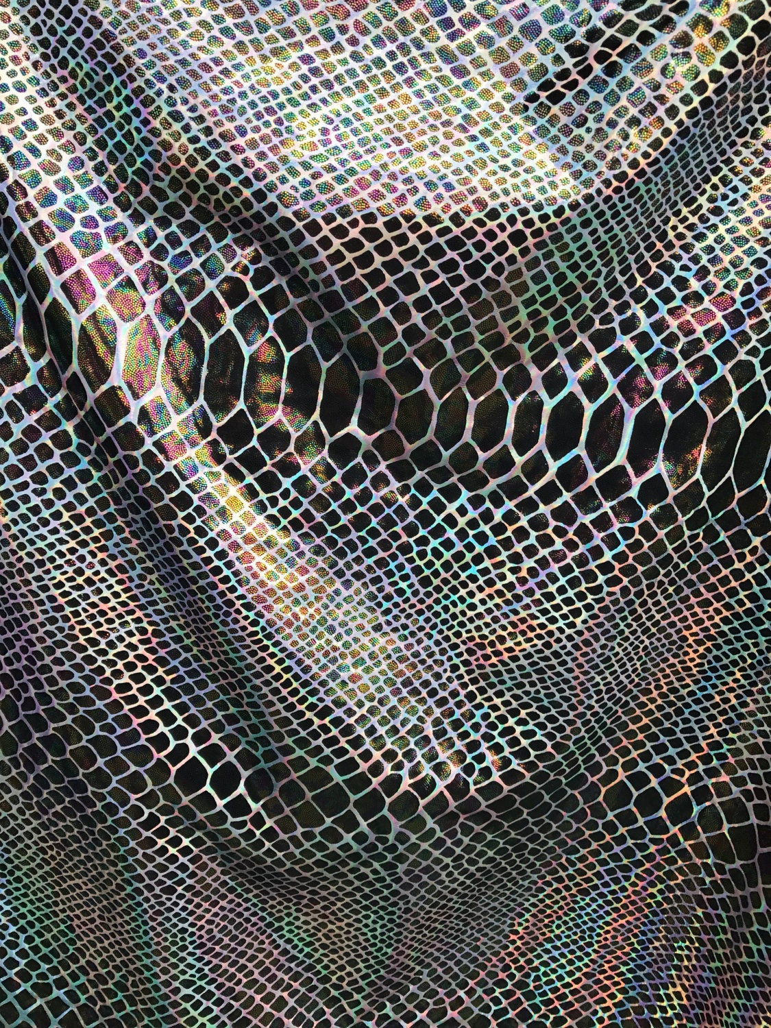 New nylon spandex COBRA design with iridescent hologram foil 4 Way Stretch 58/60" Sold by the yd. Ships worldwide from Los Angeles CA USA