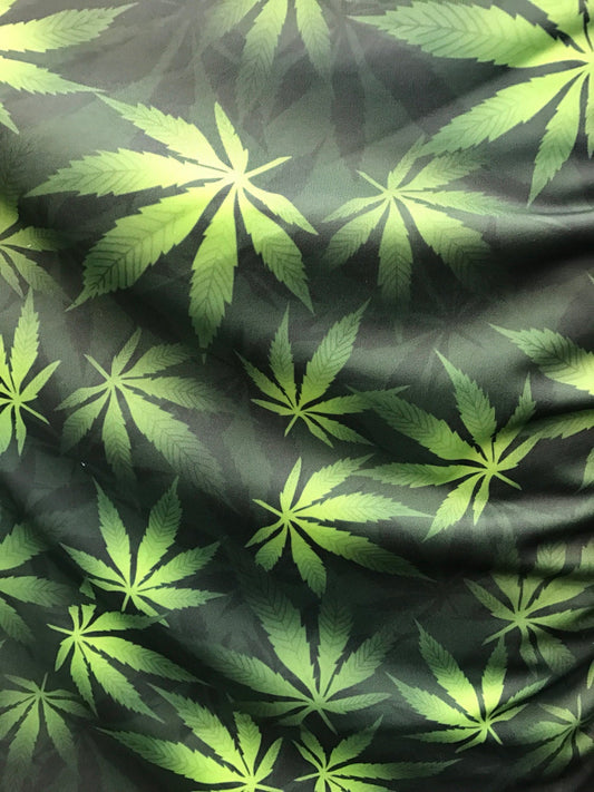 Cannabis design green color Nylon spandex 4-way Stretch 58/60" Sold bu the YD. Ships worldwide from Los Angeles California USA
