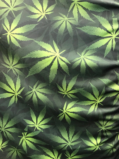 Cannabis design green color Nylon spandex 4-way Stretch 58/60" Sold bu the YD. Ships worldwide from Los Angeles California USA