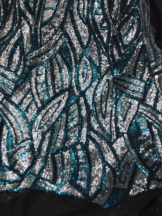 Peacock/silver glitz sequins Leaf Design one side border with mesh base 2way 54/55" Sold by the YD. Ships worldwide from Los Angeles CA, US