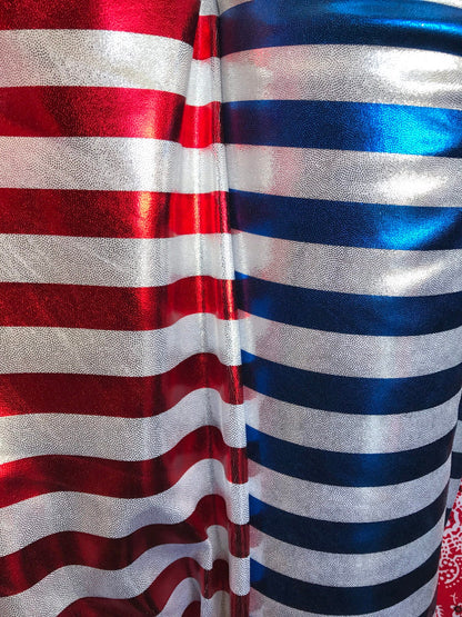 Metallic stripe nylon spandex 4way Stretch with foggy foil all over 58/60" Sold by the yd. Ships worldwide from Los Angeles California USA.