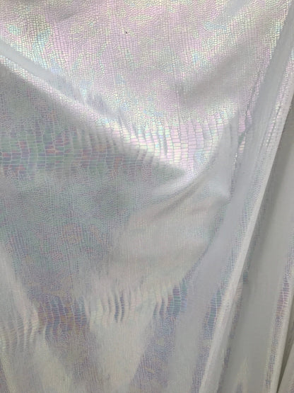 Iridescent snake design Hologram metallic foil on nylon spandex 4way Stretch 58/60" Sold by the YD. Ships worldwide from Los Angeles CA USA