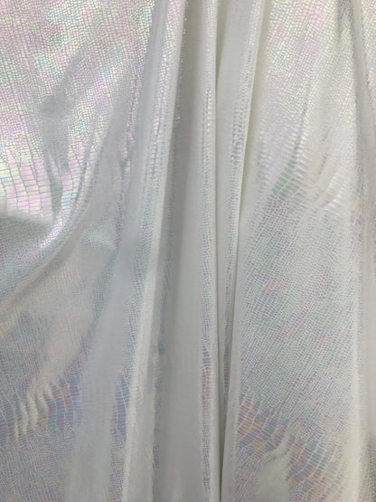 Iridescent snake design Hologram metallic foil on nylon spandex 4way Stretch 58/60" Sold by the YD. Ships worldwide from Los Angeles CA USA