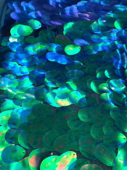 Teardrops sequins jumbo size iridescent Sequins on stretch mesh 2way stretch 58/60" Sold by the YD. Ships worldwide from Los Angeles CA USA