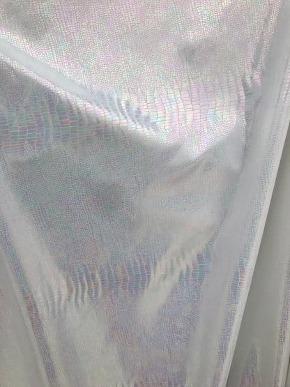 Iridescent snake design Hologram metallic foil on nylon spandex 4way Stretch 58/60" Sold by the YD. Ships worldwide from Los Angeles CA USA