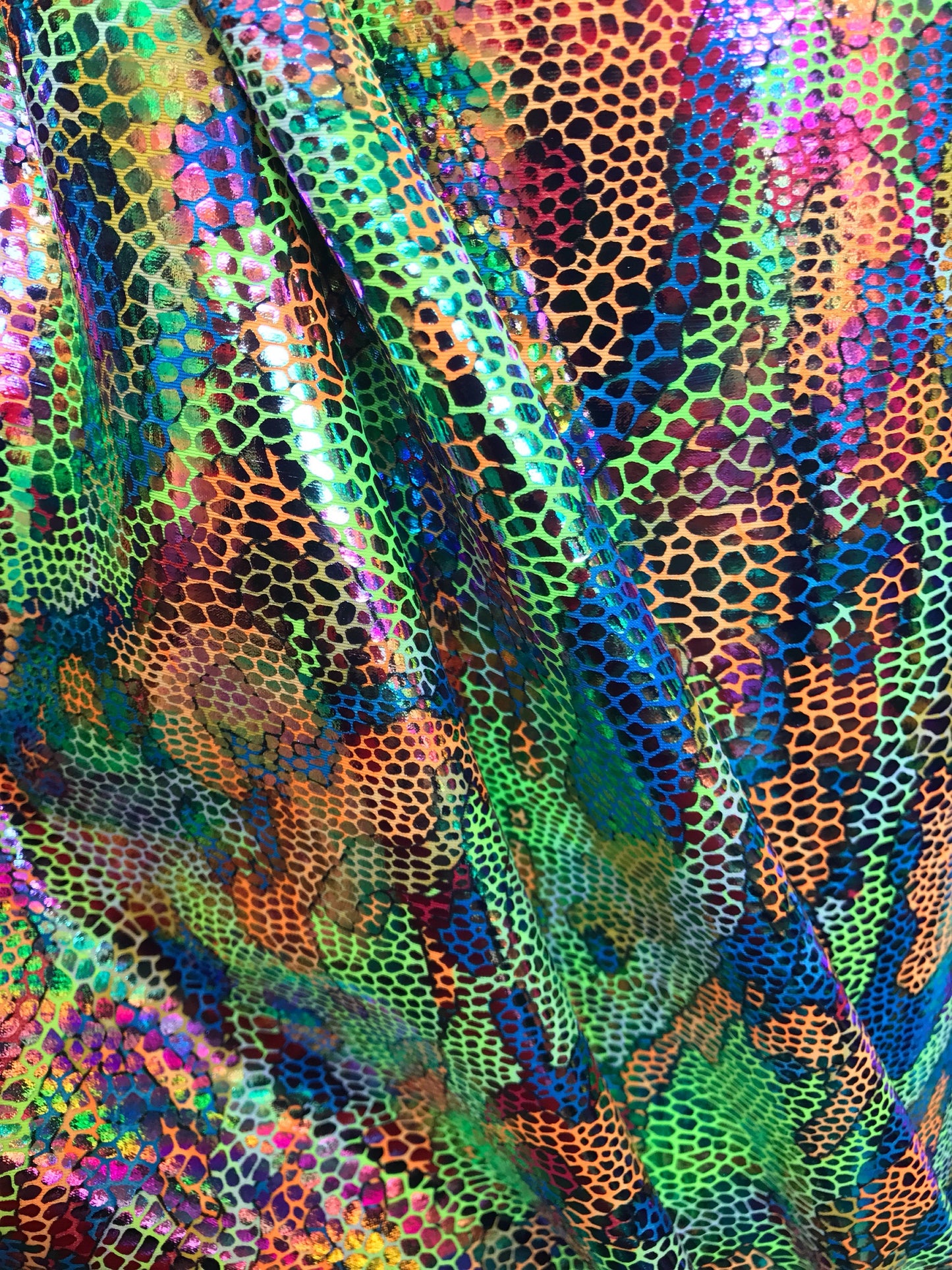 New reptile design with foil all over nylon spandex 4way Stretch 58/60" Sold by the Yd. Ships worldwide from Los Angeles California USA