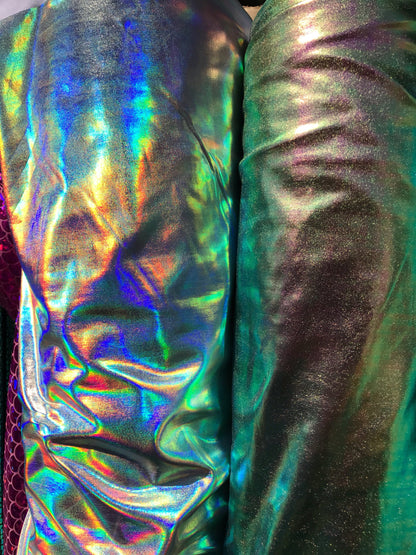 All over foil iridescent silver and Iridescent green color nylon spandex 4way stretch 58/60" Sold by the YD. Ships from Los Ángeles CA USA