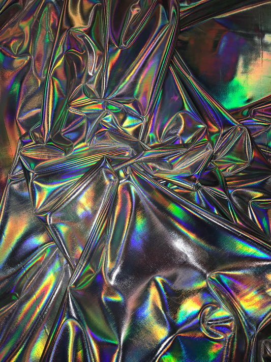 Iridescent silver all over foil metallic nylon Spandex 4way stretch 58/60" Sold by the YD. Ships worldwide from Los Angeles California USA