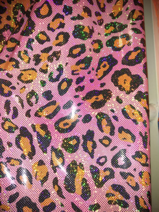 Nylon spandex leopard design Hologram foil all over on nylon spandex 4way Stretch 58/60" Sold by the YD. Ships worldwide from Los Angeles CA