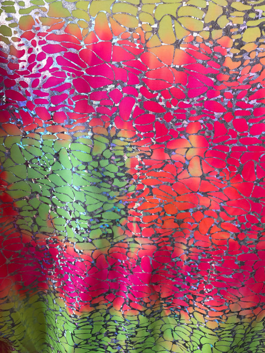 Tie dye Hologram metallic foil on nylon spandex 4way stretch 58/60" Sold by the YD. Ships worldwide from Los Angeles California USA