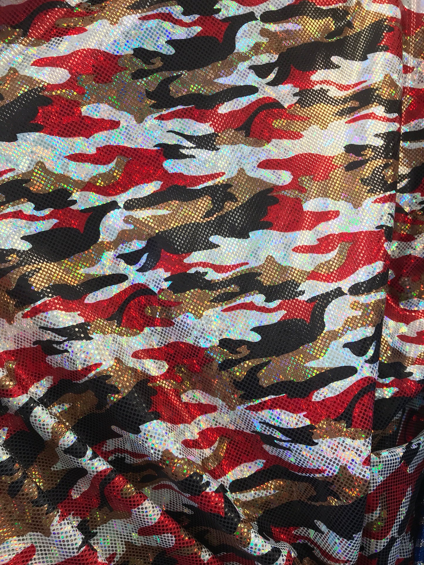 New camouflage nylon spandex metallic hologram foil multicolor 4way stretch 58/60" Sold by the YD. Ships worldwide from Los Angeles CA, USA.