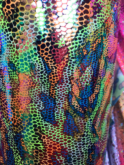 New reptile design with foil all over nylon spandex 4way Stretch 58/60" Sold by the Yd. Ships worldwide from Los Angeles California USA