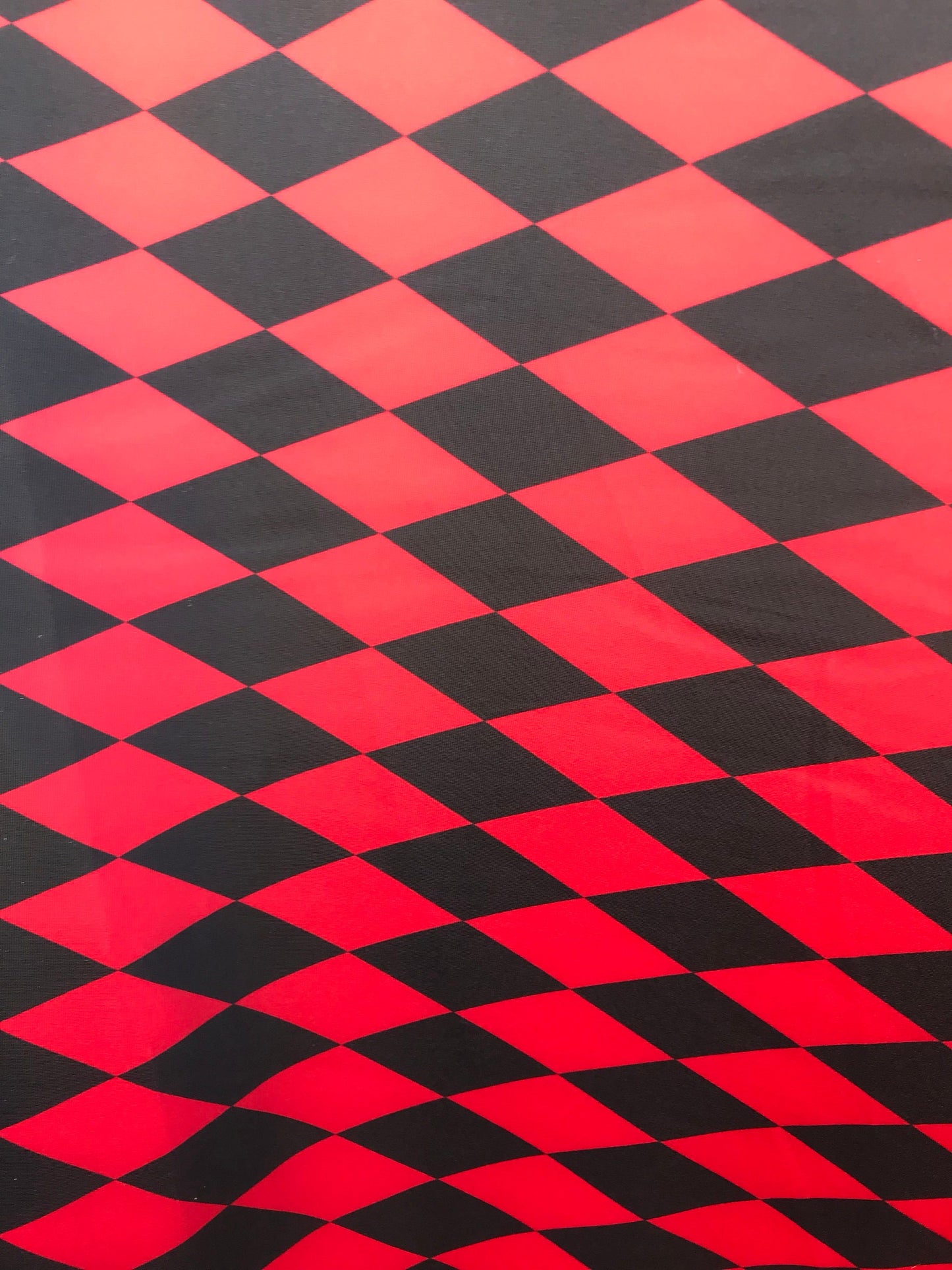 New Diamond Harlequin design black/red nylon spandex 4way stretch 58/60" Sold by the YD. Ships worldwide from Los Angeles California USA