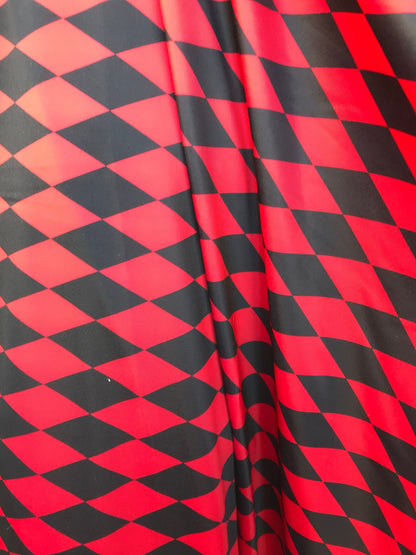New Diamond Harlequin design black/red nylon spandex 4way stretch 58/60" Sold by the YD. Ships worldwide from Los Angeles California USA