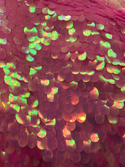 Iridescent candy pink teardrops sequins it comes with stretch mesh 2way base 58/60" Sold by the YD. Ships worldwide from Los Angeles CA