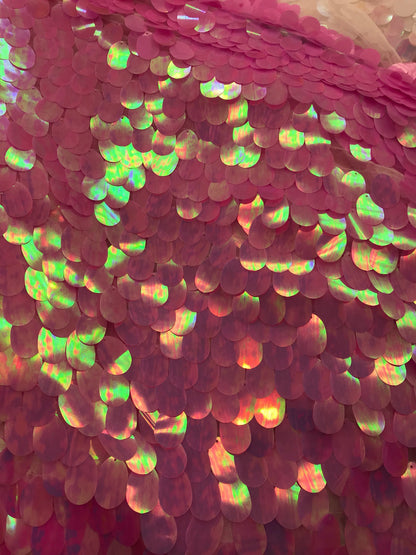 Iridescent candy pink teardrops sequins it comes with stretch mesh 2way base 58/60" Sold by the YD. Ships worldwide from Los Angeles CA