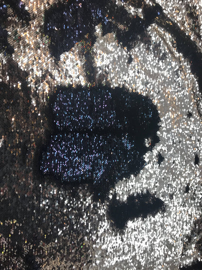 New flip up reversible sequins doble face sequins in spandex base 2way stretch 58/60" Sold by the YD. Ships worldwide from Los Angeles CA
