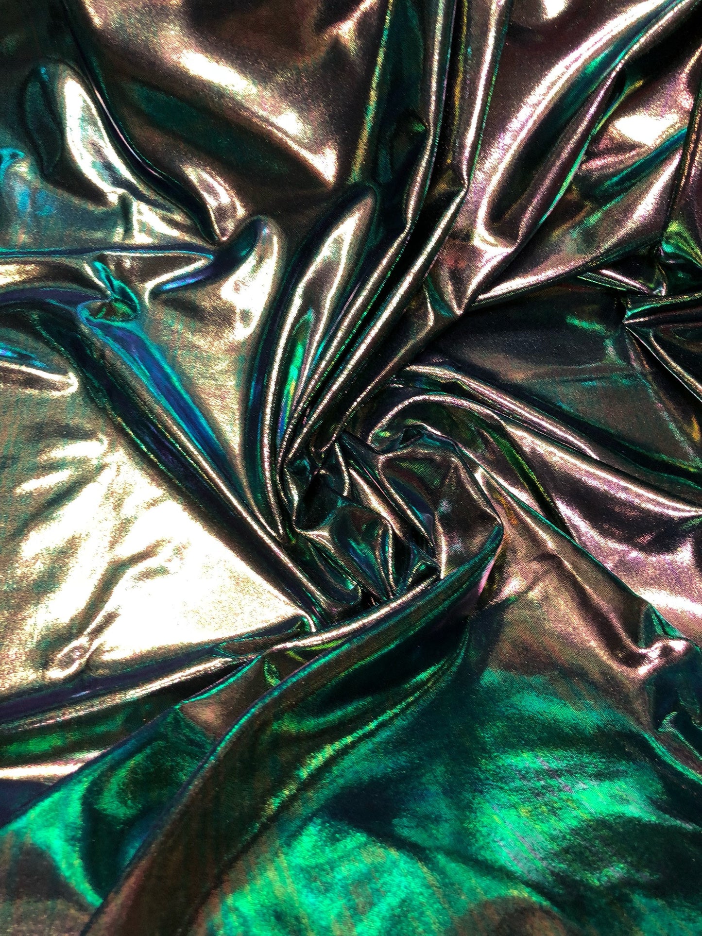 New iridescent foggy foil navy/green oil effect nylon spandex 4way stretch 58/60" Sold by the YD. Ships worldwide from Los Angeles CA.