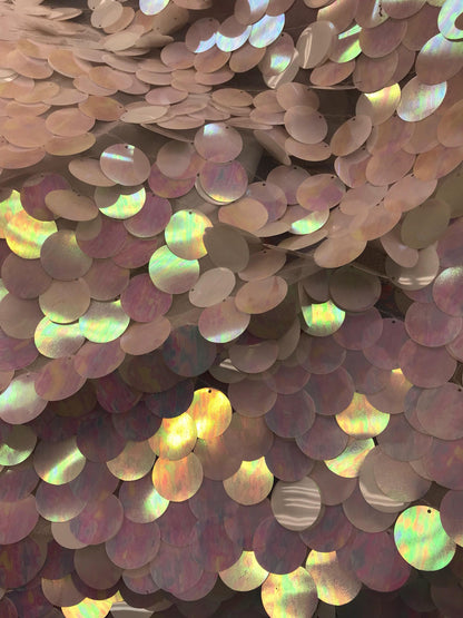 New iridescent white jumbo sequins it comes with stretch mesh 2way base 58/60" Sold by the YD. Ships worldwide from Los Angeles CA USA