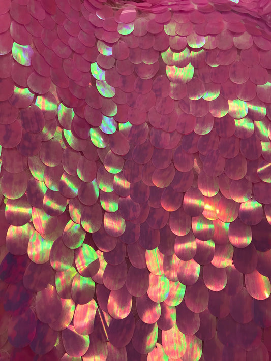 Iridescent candy pink teardrops sequins it comes with stretch mesh 2way base 58/60" Sold by the YD. Ships worldwide from Los Angeles CA