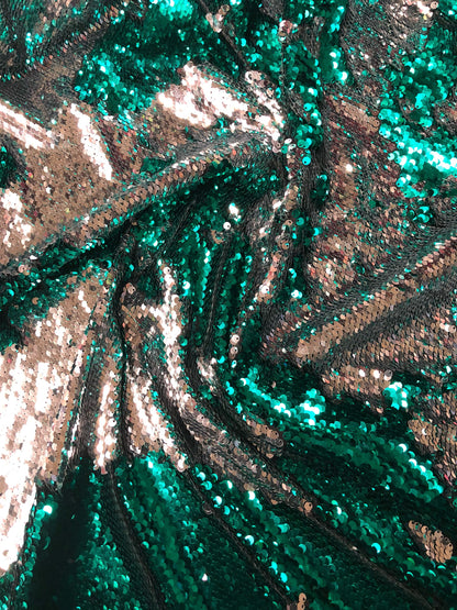 New flip up sequins reversible sequins jade/silver spandex base 2way strech 58/60" Sold by the YD. Ships worldwide from Los Angeles CA USA