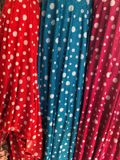 New spandex polka dots Design with glitter 4 way stretch 58/60" Sold by the YD. Ships worldwide from Los Angeles California USA.