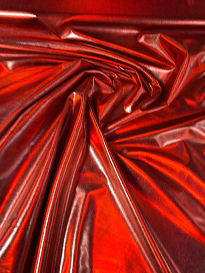 New iridescent red all over foil metallic nylon spandex 4way stretch 58/60" Sold bu the YD. Ships worldwide from Los Angeles California USA