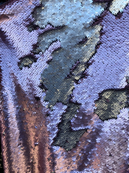 Flip up sequins reversible sequins 2 tone  it comes on spandex base 2way Stretch 58/60" Sold by the YD. Ships worldwide from Los Ángeles CA