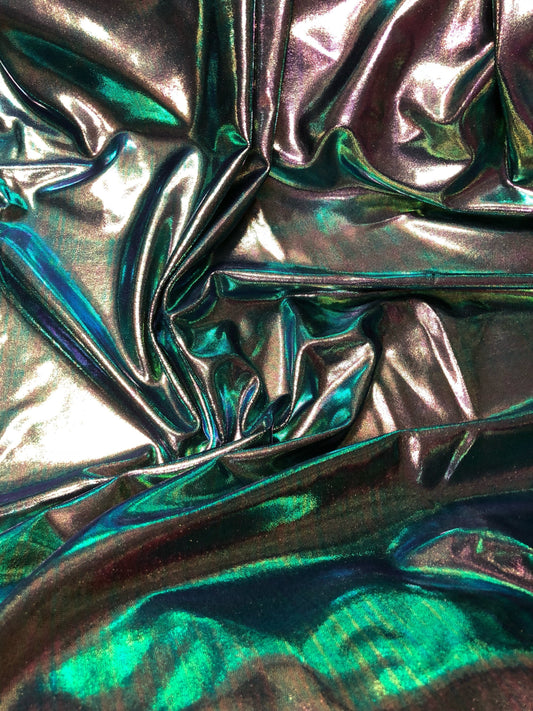 New iridescent foggy foil navy/green oil effect nylon spandex 4way stretch 58/60" Sold by the YD. Ships worldwide from Los Angeles CA.