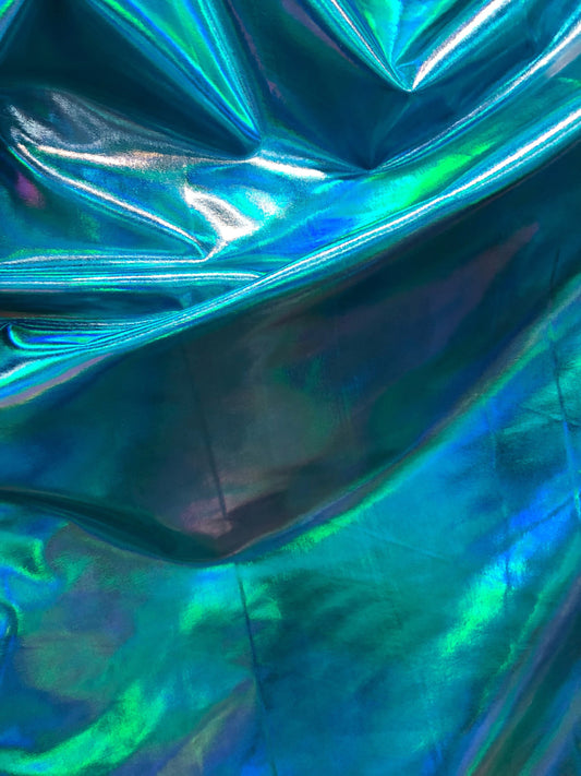 New iridescent all over foil nylon spandex 4way Stretch 58/60" Sold by the YD. Ships worldwide from Los Angeles California USA.