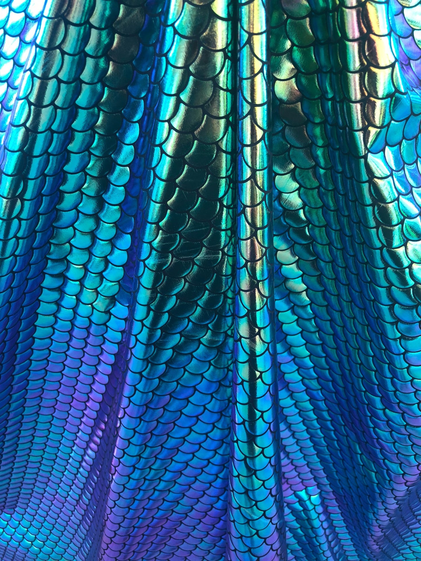 Mermaid design fish scael green with blue turquoise effect Nylon 4way Stretch 58/60" Sold by the YD. Ships worldwide from Los Angeles CA USA