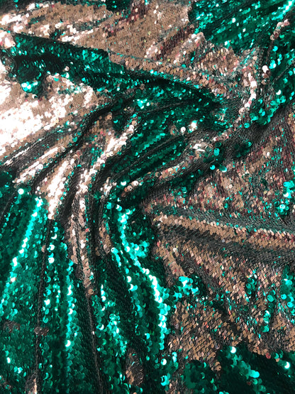 New flip up sequins reversible sequins jade/silver spandex base 2way strech 58/60" Sold by the YD. Ships worldwide from Los Angeles CA USA