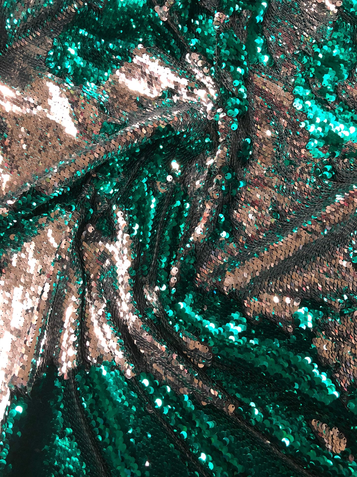 New flip up sequins reversible sequins jade/silver spandex base 2way strech 58/60" Sold by the YD. Ships worldwide from Los Angeles CA USA