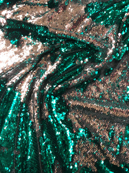 New flip up sequins reversible sequins jade/silver spandex base 2way strech 58/60" Sold by the YD. Ships worldwide from Los Angeles CA USA