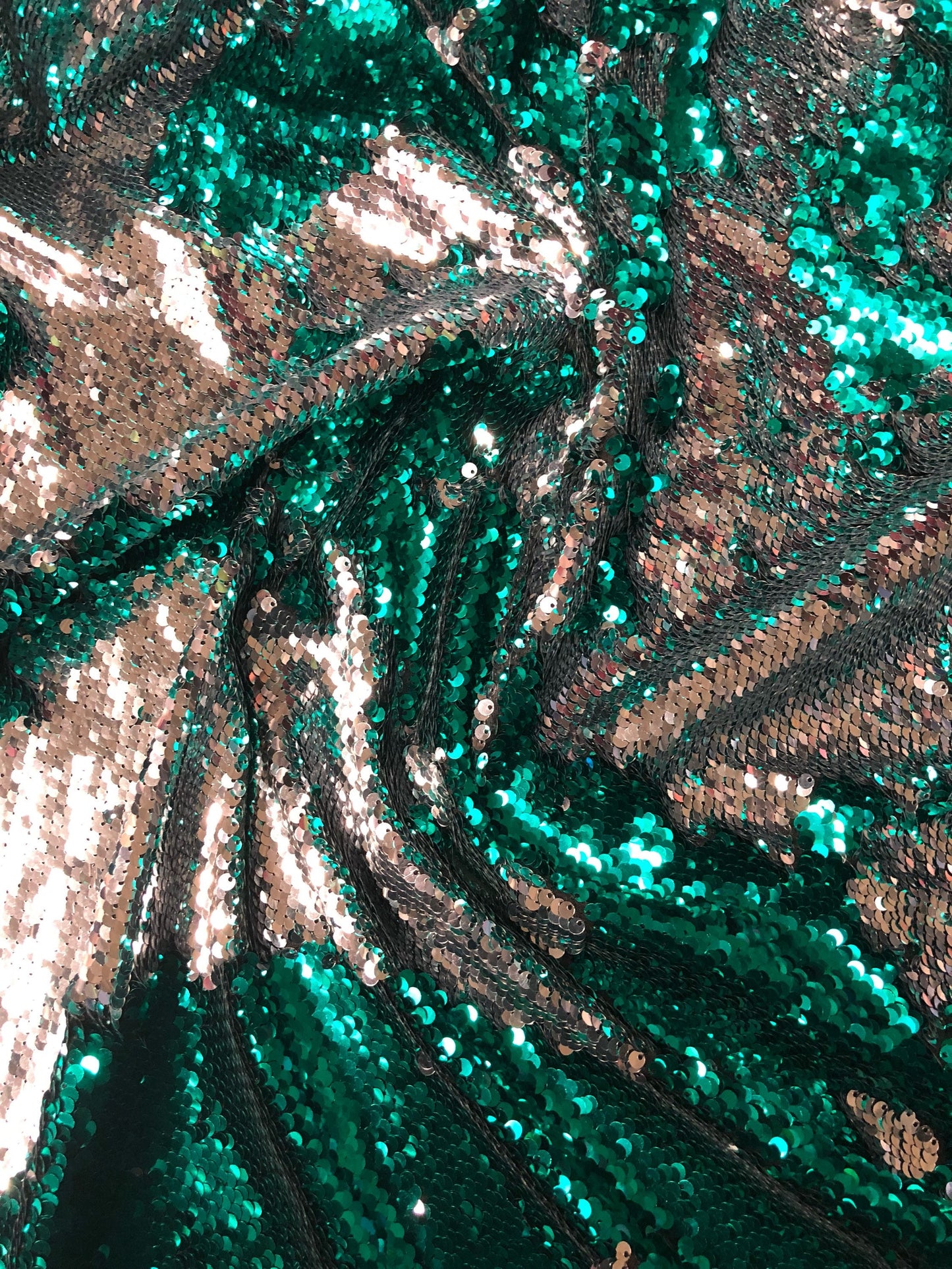 New flip up sequins reversible sequins jade/silver spandex base 2way strech 58/60" Sold by the YD. Ships worldwide from Los Angeles CA USA