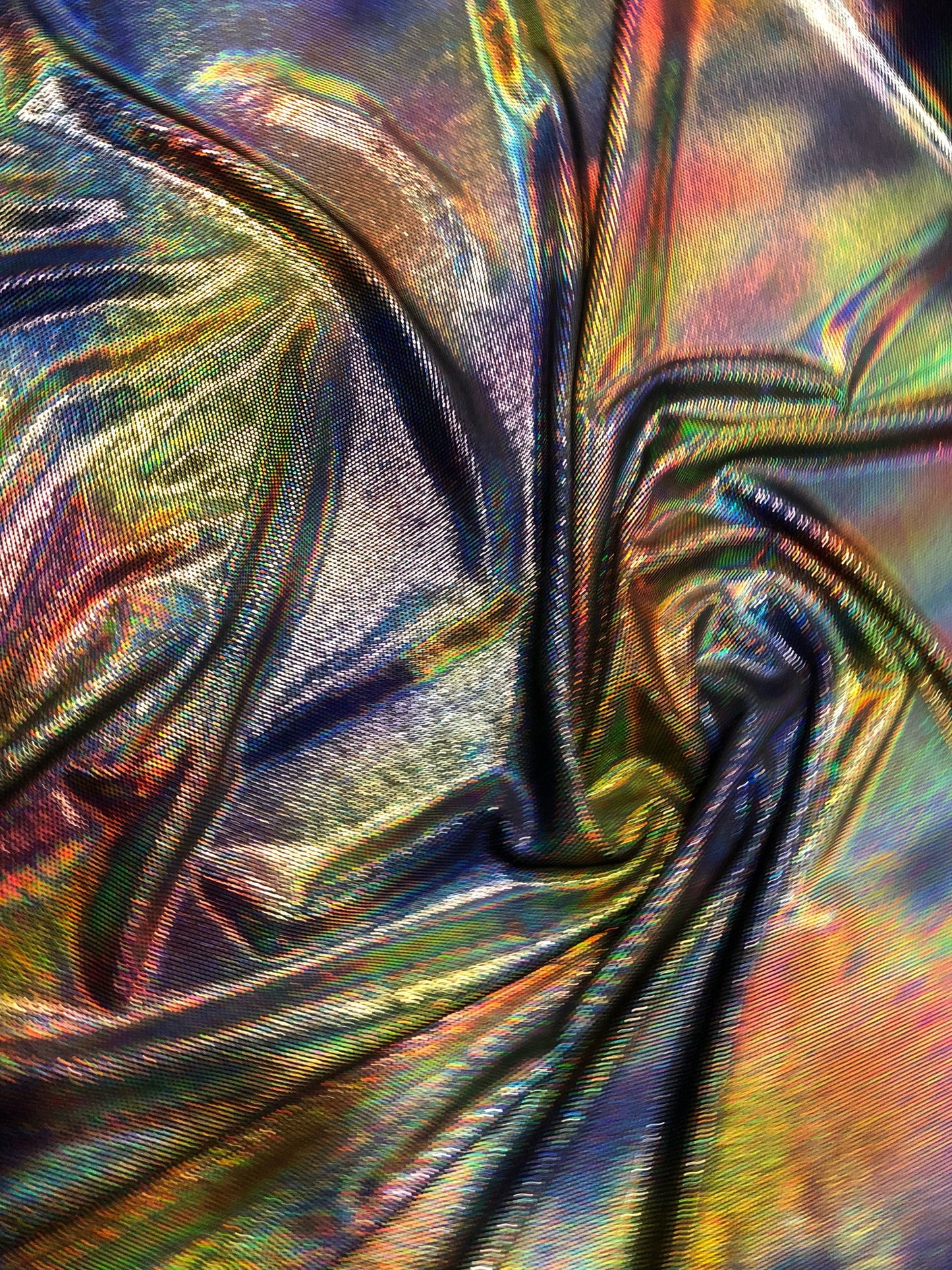 New iridescent lava foil on stretch velvet 4way Stretch 58/60" Sold by the YD. Ships worldwide from Los Angeles California USA.