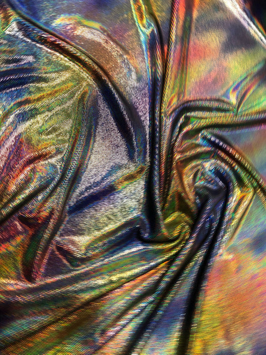 New iridescent lava foil on stretch velvet 4way Stretch 58/60" Sold by the YD. Ships worldwide from Los Angeles California USA.
