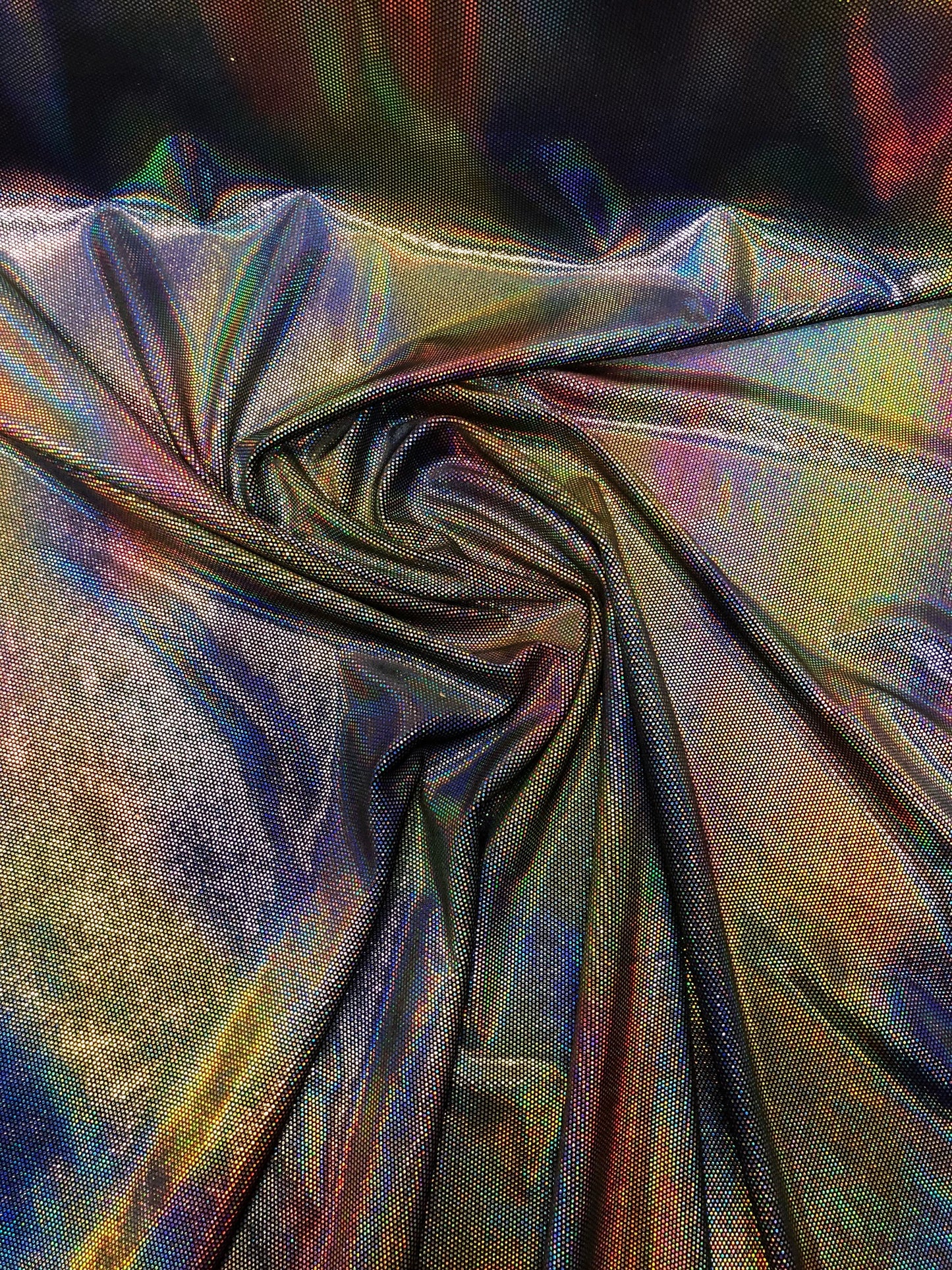 New iridescent lava foil on stretch velvet 4way Stretch 58/60" Sold by the YD. Ships worldwide from Los Angeles California USA.