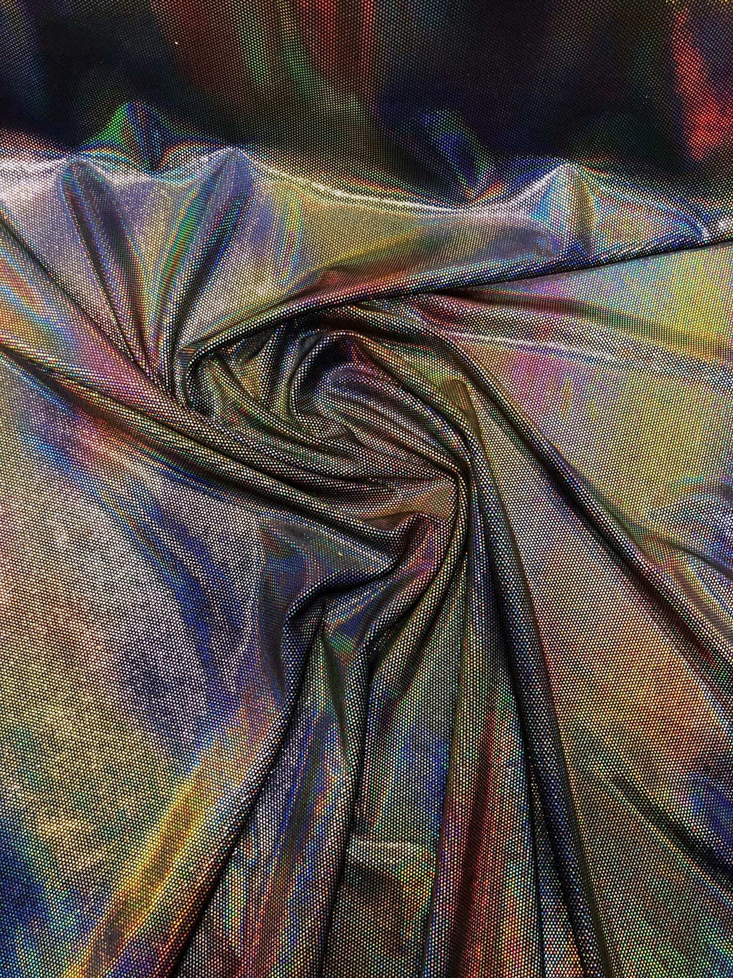 New iridescent lava foil on stretch velvet 4way Stretch 58/60" Sold by the YD. Ships worldwide from Los Angeles California USA.