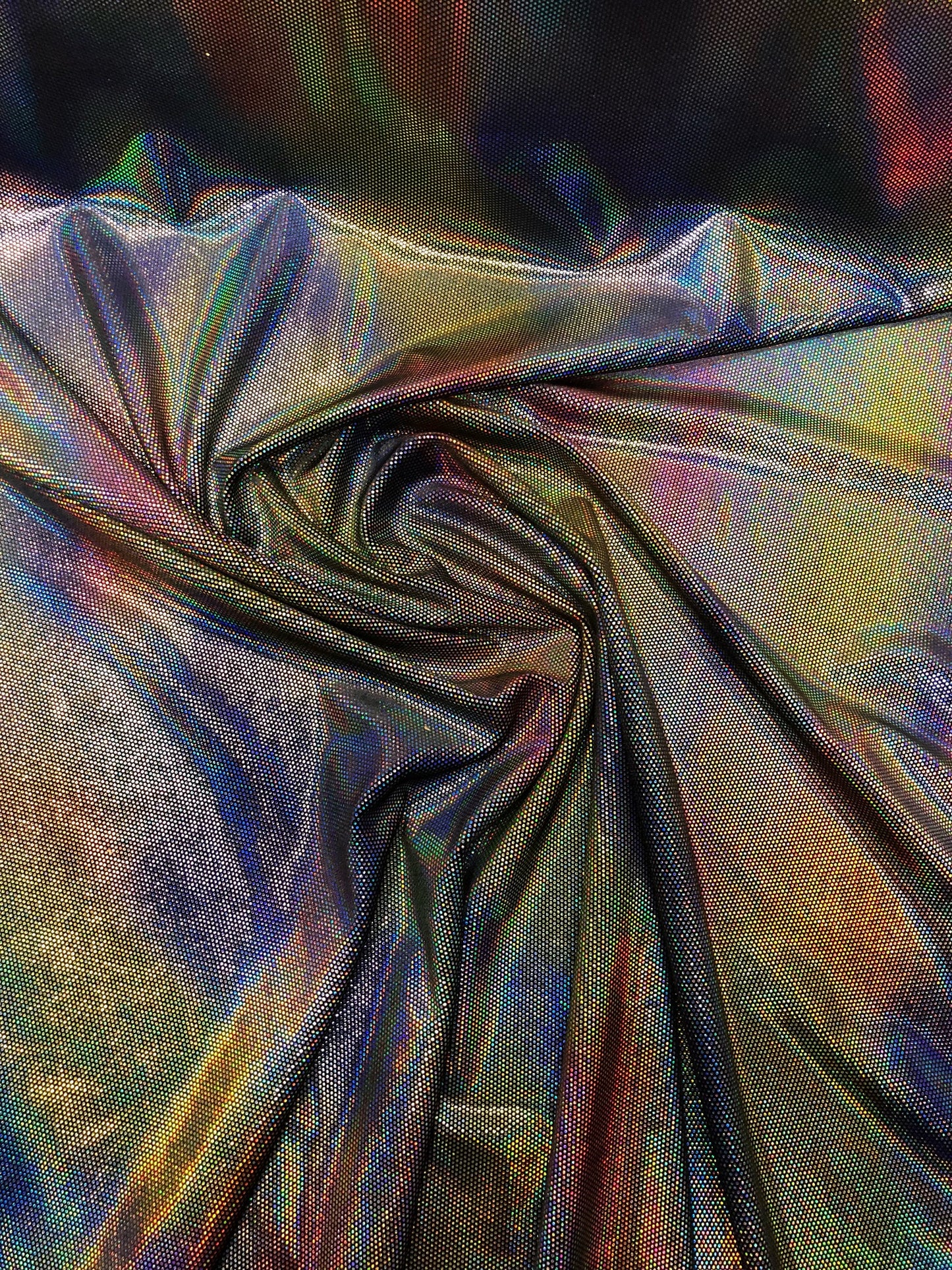 New iridescent lava foil on stretch velvet 4way Stretch 58/60" Sold by the YD. Ships worldwide from Los Angeles California USA.